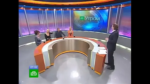 HD Bimbo blonde on panel of Russian TV show - upskirt porn at energy Movies